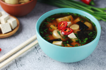 A bowl with miso soup, traditional Japanese dish