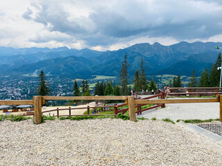 Wooden terrace with a view of the mountains in the background