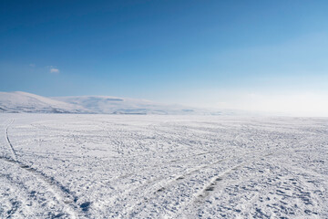 Snow covered frozen ice lake Cildir,Kars.  - 590752337