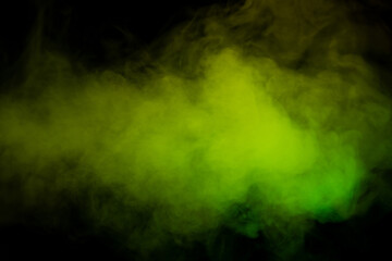 Obraz na płótnie Canvas Yellow and green steam on a black background.