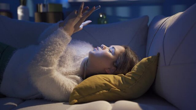 Depressed young woman suffers from love.
Abandoned, cheated young woman is unhappy and sad at home at night.
