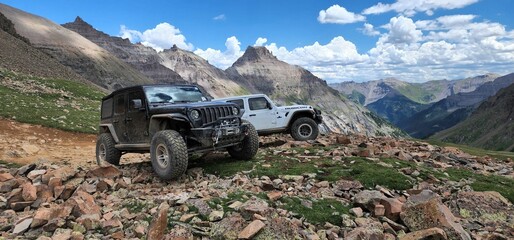 Fototapeta premium Jeep Wrangler Unlimited and Jeep JK CARS on Yankee Boy Basin Mine mountains Ouray, Colorado
