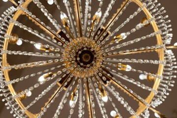 Low-angle shot of a vintage-style chandelier with decorative diamonds