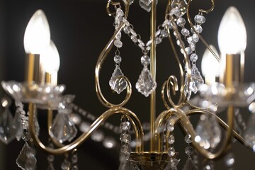 Close-up shot of a vintage-style chandelier with decorative diamonds