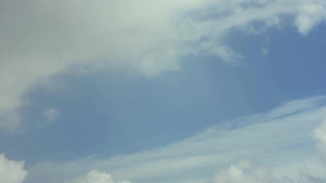 Cloud time lapse. Altocumulus stratiformis radiatus, cirrocumulus clouds. 4K UHD video footage 3840X2160.