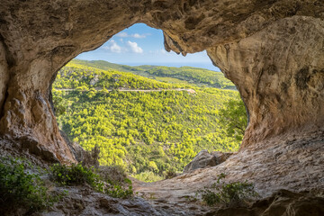 Lookout view from the Damianos cave on Zakynthos island, Greece. - 590767314