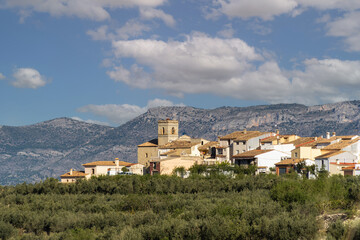 Small town with mountains on the background. In Catamarruch, Alicante (Spain).