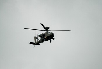 Military helicopter landing in flight