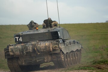 Military tank in a battlefield