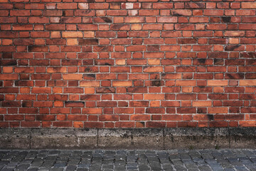 Textured old brick wall providing a unique backdrop