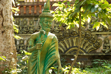 Ancient statue of wiseacre elder in Cambodia