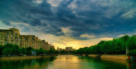 River in the city on a cloudy sunset