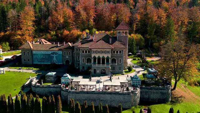 Aerial shot of the Cantacuzino Castle during the day in Busteni, Romania