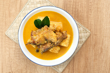 Mangut, made from smoked stingray fish cooked with spices and coconut milk. Indonesian traditional food.
