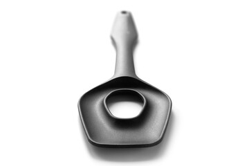 Kitchen tools. Plastic kitchen tool isolated on white background. Selective focus