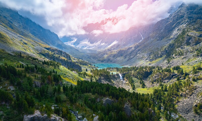 Naklejka premium Amazing nature landscape turquoise Kuyguk waterfall and Kuiguk lake in Altai mountains, Siberia Russia. Aerial top view