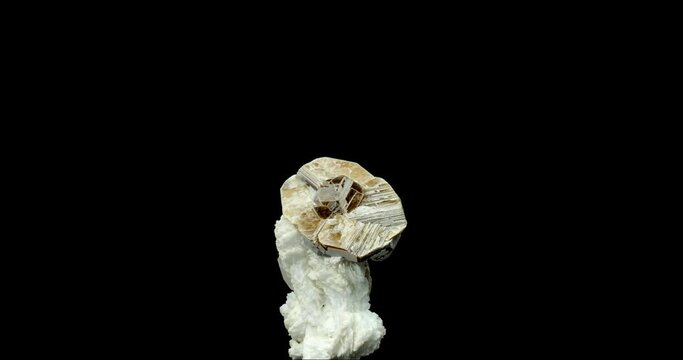 muscovite (mica) rotating on 360&deg; in 4k. macro detail texture background. close-up raw rough unpolished semi-precious gemstone