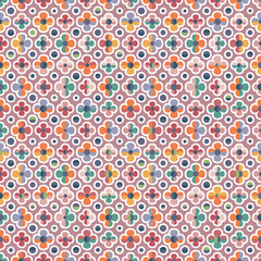 Summer abstract seamless vector pattern with stylised colourful happy flowers and polka dots on pink. Decorative geometric floral grid texture for wallpaper, prints, fashion fabrics and home decor.