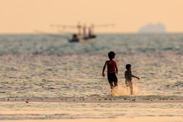 people walking on the beach