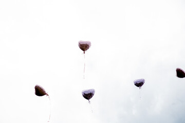 heart air balloon flying in the sky