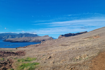 Beautiful rocky coast of the island, bright sunny day.