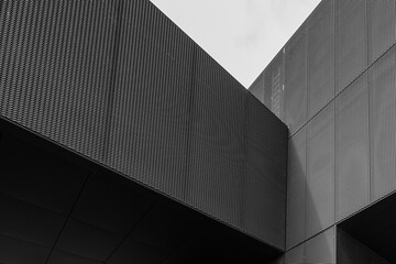 Black and white tone, Exterior architectural detail of aluminium perforated cladding facade of...