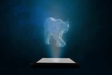 A hologram of a lynx projected over a tablet with an abstract blue background. Futuristic depiction of animals.