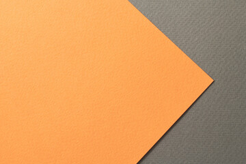 Rough kraft paper background, paper texture black orange colors. Mockup with copy space for text