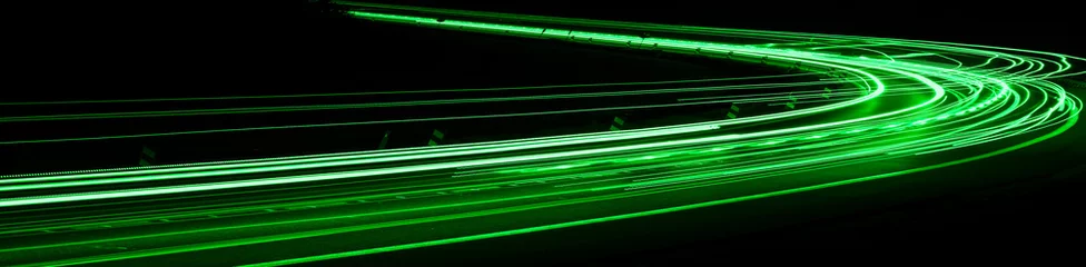 Foto op Plexiglas Snelweg bij nacht green car lights at night. long exposure