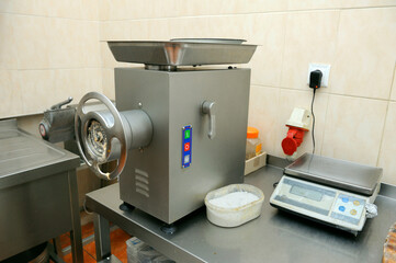 Pro blender, electronic scales set on restaurant kitchen desk ready for work