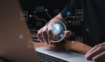 Selective focus at human hand while type or input a command to navigate chatbot or AI to get answer or information from big database. Artificial intelligence that can provide SEO or business info.