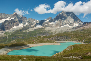 Fototapeta na wymiar The Matterhorn Mount and the lake Lago del Goillet. Breuil-Cervinia, Italy