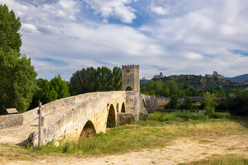 stone bridge over Ebro river in Frias, Burgos province, Castilla Leon, Spain