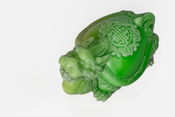 a Jade statue of a turtle on a white background，finely detailed features. 3D illustration.