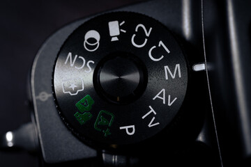 Camera mode dial with manual mode selected. Mode dial on a digital camera