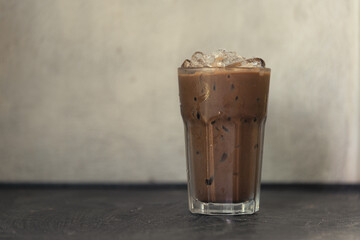 Ice Mocha coffee in glass. Cafe culture photography concept.