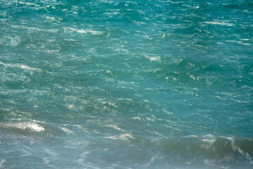 Naklejka na ściany i meble background texture of the blue sea