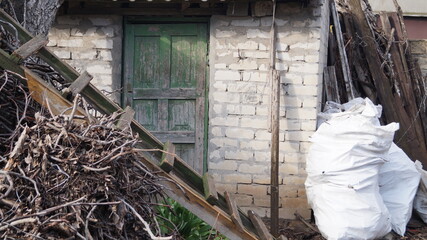 Obraz premium bag with construction debris and branches