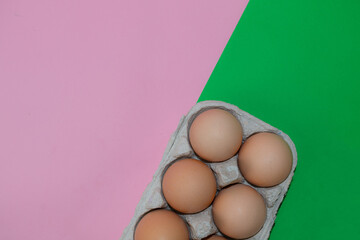 chicken eggs on a colored background. top view. easter concept