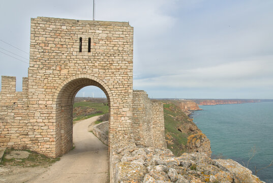 The walls of an ancient fortress on the edge of the rocks on the Black Sea coast. Medieval fortress "Timum-West" end of the 10th and the beginning of the 11th centure