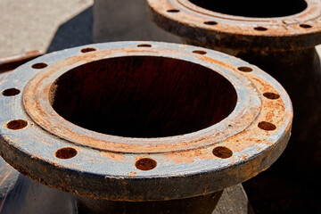 Close-up of an old rusty large shut-off valve for water.