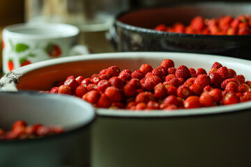 Lots of strawberries. Strawberries are in a bowl.