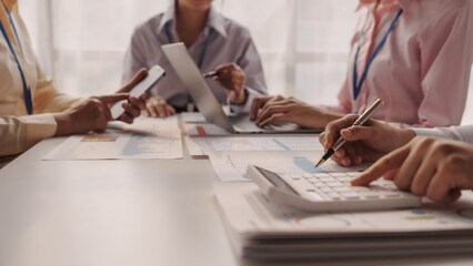 Close up brainstorming of asian businesswoman, bookkeeping, industrial sector of government partnership company, colleague working together to check audit, balance sheet to prevent fraud and bribery