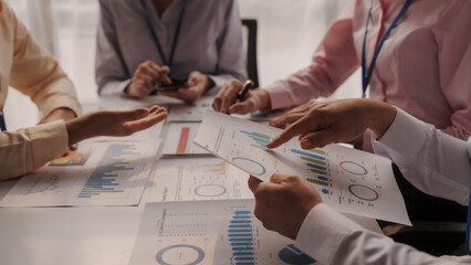 Close up brainstorming of asian businesswoman, bookkeeping, industrial sector of government partnership company, colleague working together to check audit, balance sheet to prevent fraud and bribery © R Photography