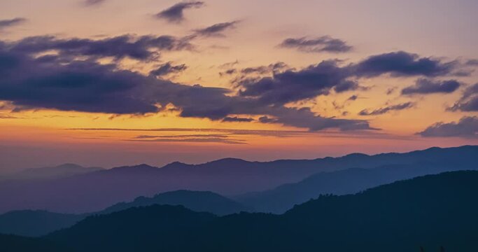 Sunrise timelapse in the morning at Doi Kad Phee, Chiang Rai, Thailand, December 2022