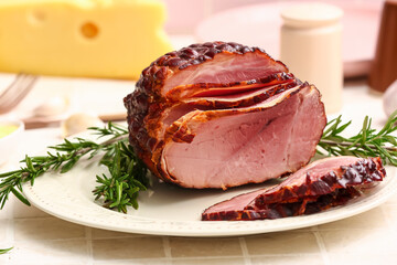 Plate with tasty smoked ham on light tile background