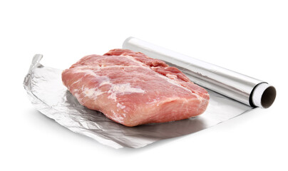 Aluminium foil roll with piece of raw meat on white background