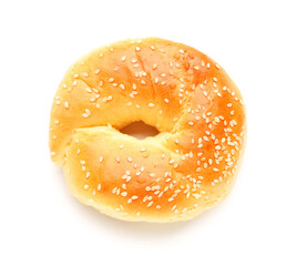 Tasty bagel with sesame seeds on white background