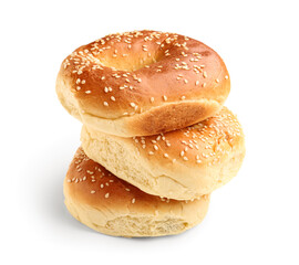 Tasty bagels with sesame seeds on white background