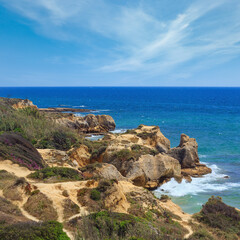 Fototapeta na wymiar Summer Atlantic rocky coast view (Albufeira outskirts, Algarve, Portugal).